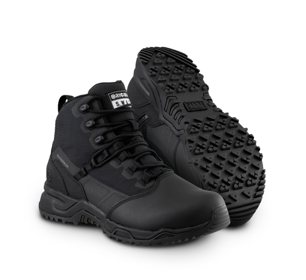 A pair of Original SWAT black tactical boots with a polishable toe and side zipper, featuring a non-marking rubber outsole.