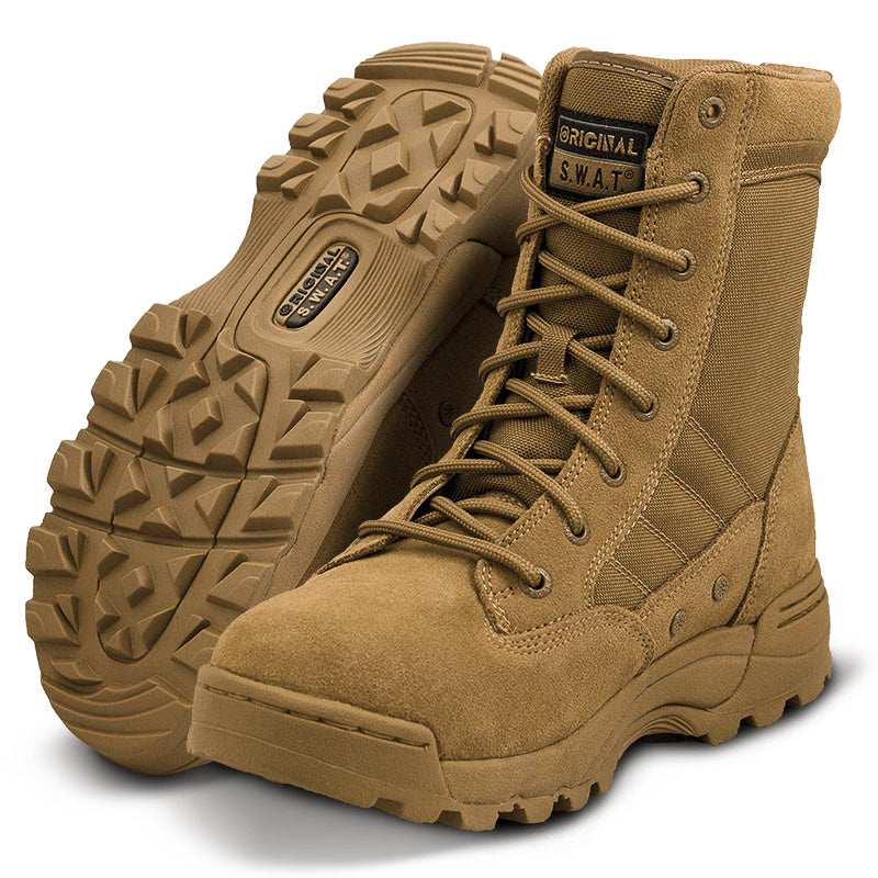 A pair of coyote tactical boots designed for law enforcement and military operations, featuring a lace-up closure, rubber outsole.