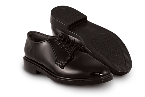 Two gloss leather dress shoes show the outsole and upper side of shoe design
